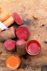 Fototapeta na wymiar mix fresh beetroot and carrot juice