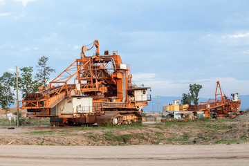 Part of a pit with big mining truck working