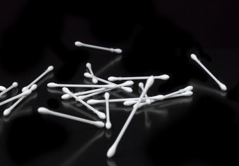 Cotton Swabs on Black Background