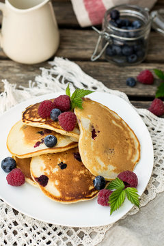Homemade pancakes with raspberries and blueberries