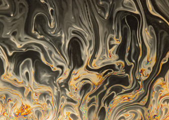 Spooky halloween psychedelic patterns formed on the surface of soap bubbles