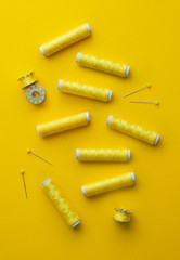 Yellow thread spools