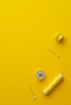 Yellow thread spools