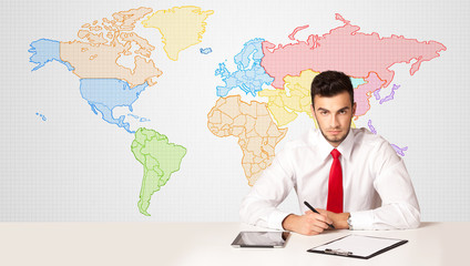 Business man with colorful world map background