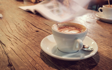 Focus your coffee bubble Picture books as a background.