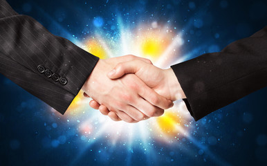 Two business men shaking hands
