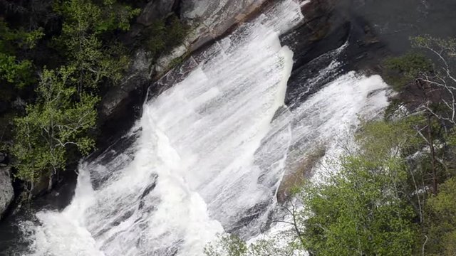 On a high release water day, Oceania Falls roar over a rock face in the Tallulah Gorge