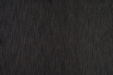 Dark woven cotton fabric texture.