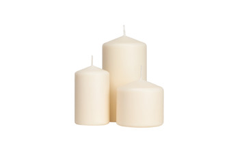 White candle on a dark wooden floor.