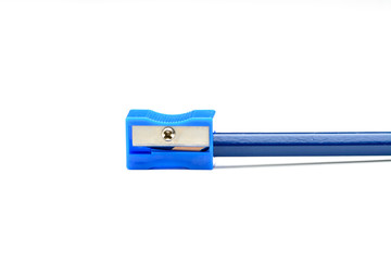 Blue pencil and a pencil sharpener