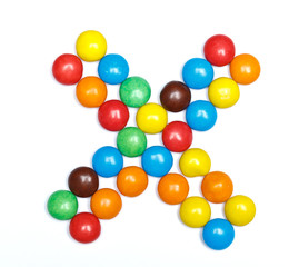 symbol sign multiply of colorful candy on a white background