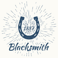 horseshoe and vintage sun burst frame. Blacksmith emblem - 88709058