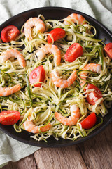 Dietary food: zucchini pasta with shrimp closeup. Vertical
