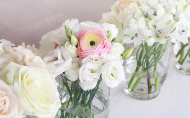 Obraz na płótnie Canvas Wedding flower arrangement , pink ranunculus, white roses