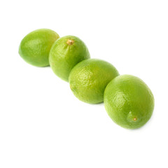 Four limes fruits composition isolated over the white background