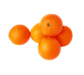 Pile of multiple ripe oranges, isolated over the white