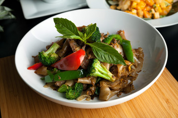 Drunken Noodle Thai Dish © ArenaCreative