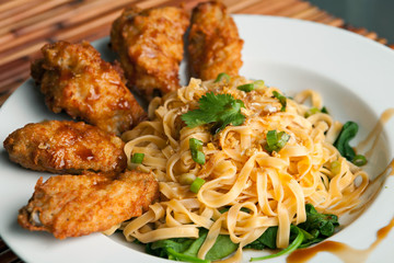 Chicken Wings with Noodles and Spinach
