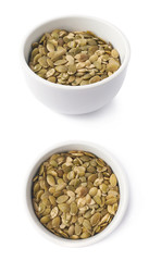 White cup filled with pumpkin seeds