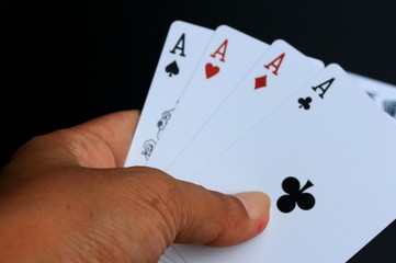 Playing cards on black background