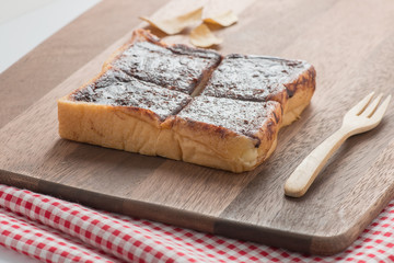 Chocolate bread on wooden cutting board