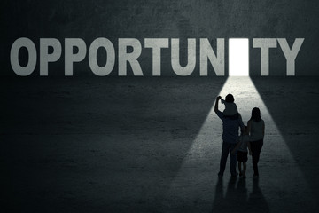 Fototapeta premium Family walks into opportunity door