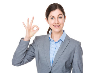 Young Businesswoman with ok sign gesture