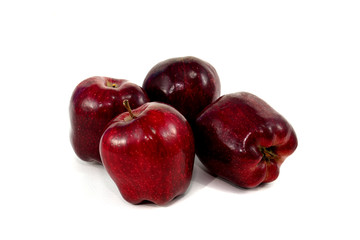 Red apples on white background.