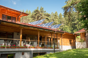 Solar panel on a red roof