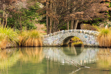Naklejka premium stone bridge in garden