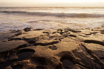 Sea surf on rocks in area  La Pared on Fuerteventura