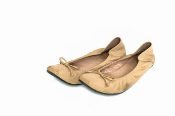 Old cream woman shoes isolated on white background