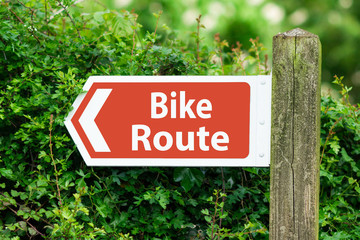 Direction Arrow, Sign To Bike Route in Red Color - Powered by Adobe