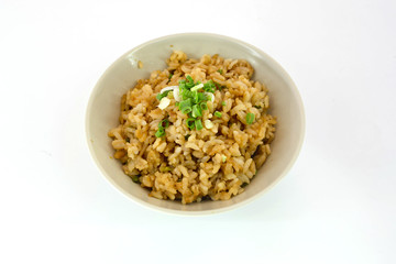 garlic fried rice with vegetable on top