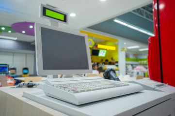 Empty cash desk with computer terinal in supermarket
