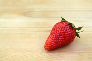Strawberry on wooden background