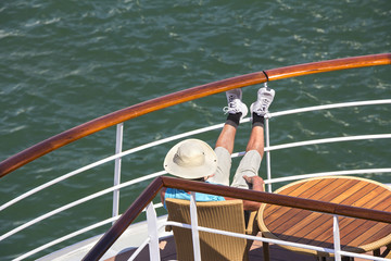 The man enjoys the sailing cruise ship