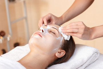 Attractive woman having mask in spa salon 