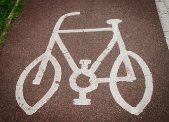 Bicycle sign painted on the road asphalt in United Kingdom