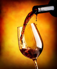Red wine on orange background