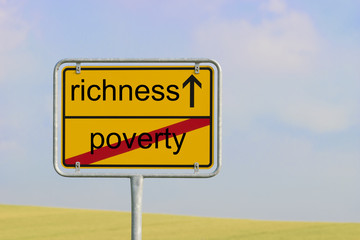 sign poverty richness