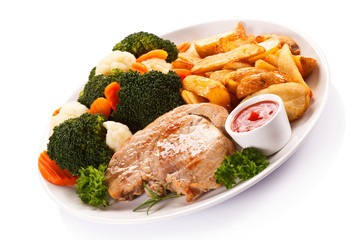 Steak, baked potatoes and vegetables 