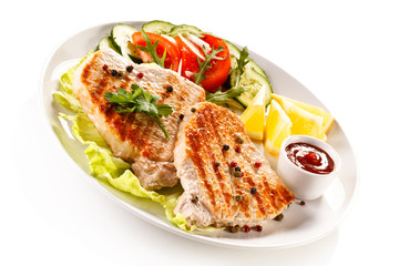 Grilled steaks and vegetable salad 