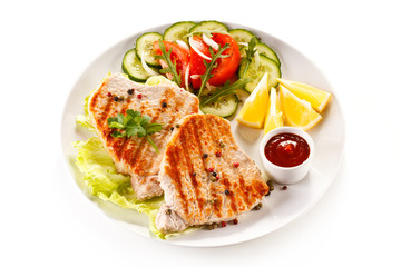 Grilled steaks and vegetable salad 
