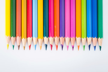 Colour pencils isolated on white background close up