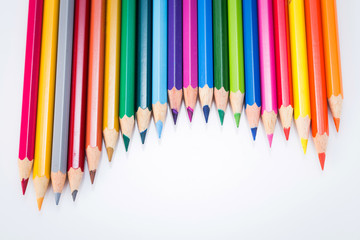 Colour pencils isolated on white background close up