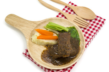 Delicious honey pork ribs baked with vegetable