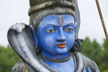 Exterior detail of the Shiva statue at Ganga Talao (Grand Bassin) Hindu temple, Mauritius. It's a...