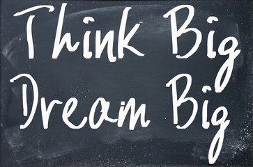 think big dream big text write on blackboard