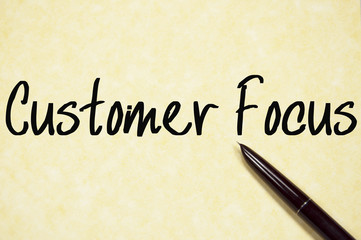 customer focus text write on paper